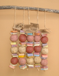 Soap Collars: a string of small offcuts of soap threaded on a roap.